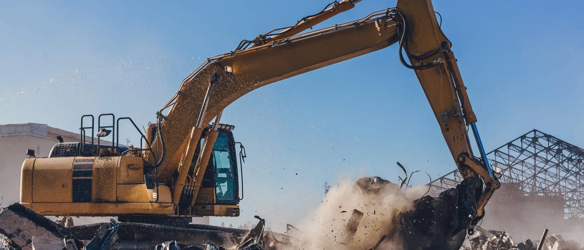 Excavator working on a demolition site