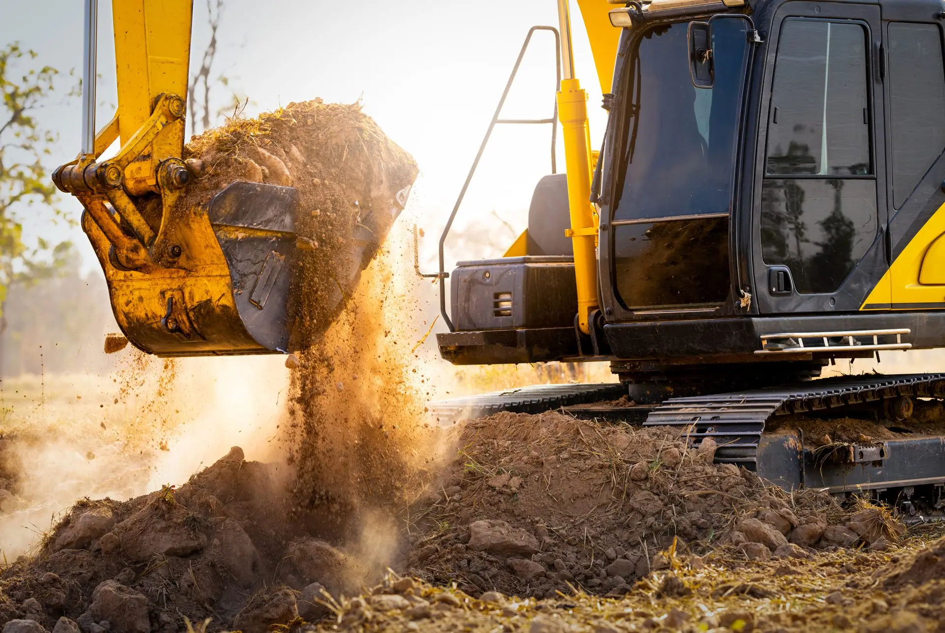 Excavator digging soil during civil earthworks
