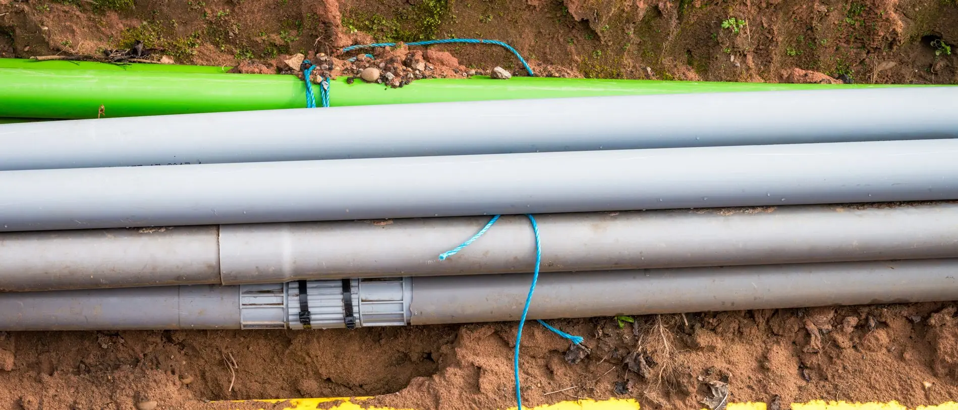 Underground service pipes laid in an open trench