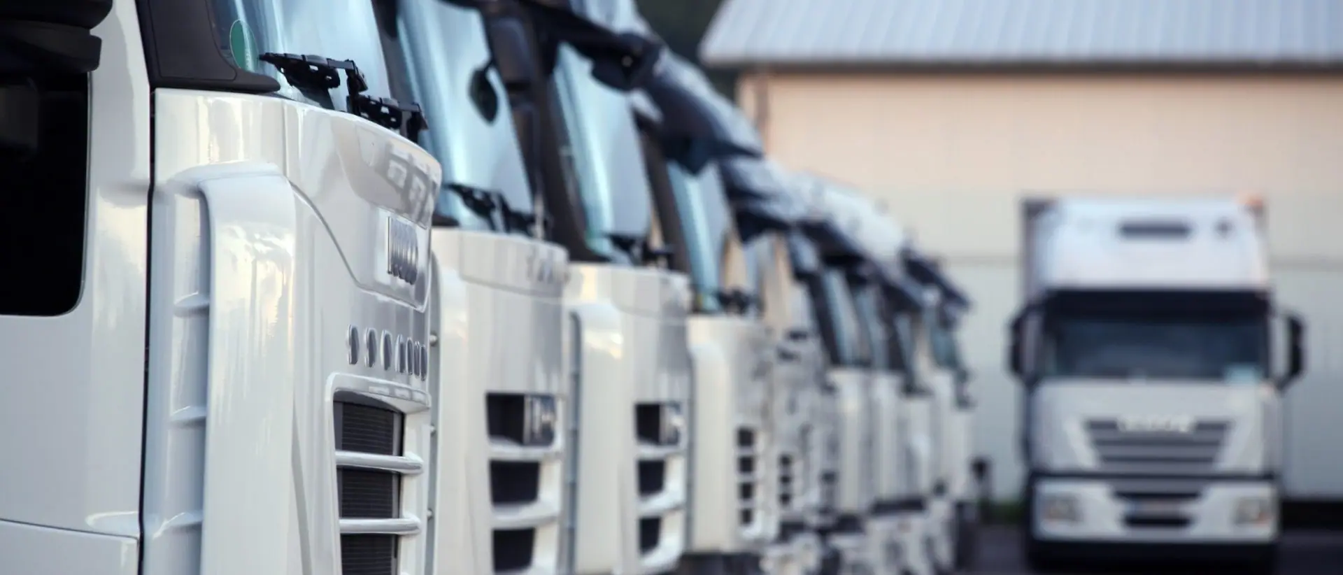Line of heavy vehicles at a transport depot